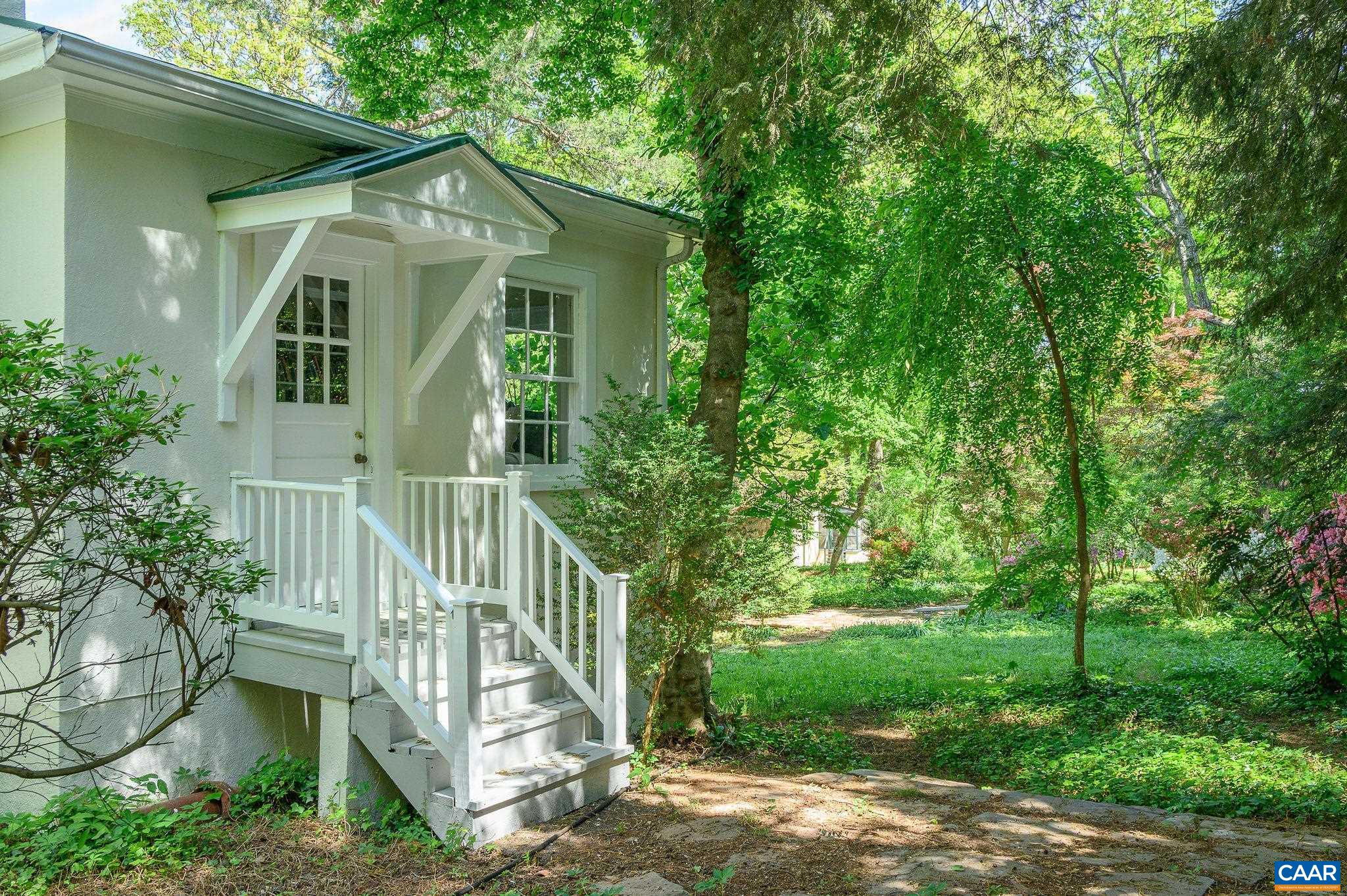 1326 Rugby Road Charlottesville, VA 22903 - Photo 46 of 65 a front view of a house with a yard