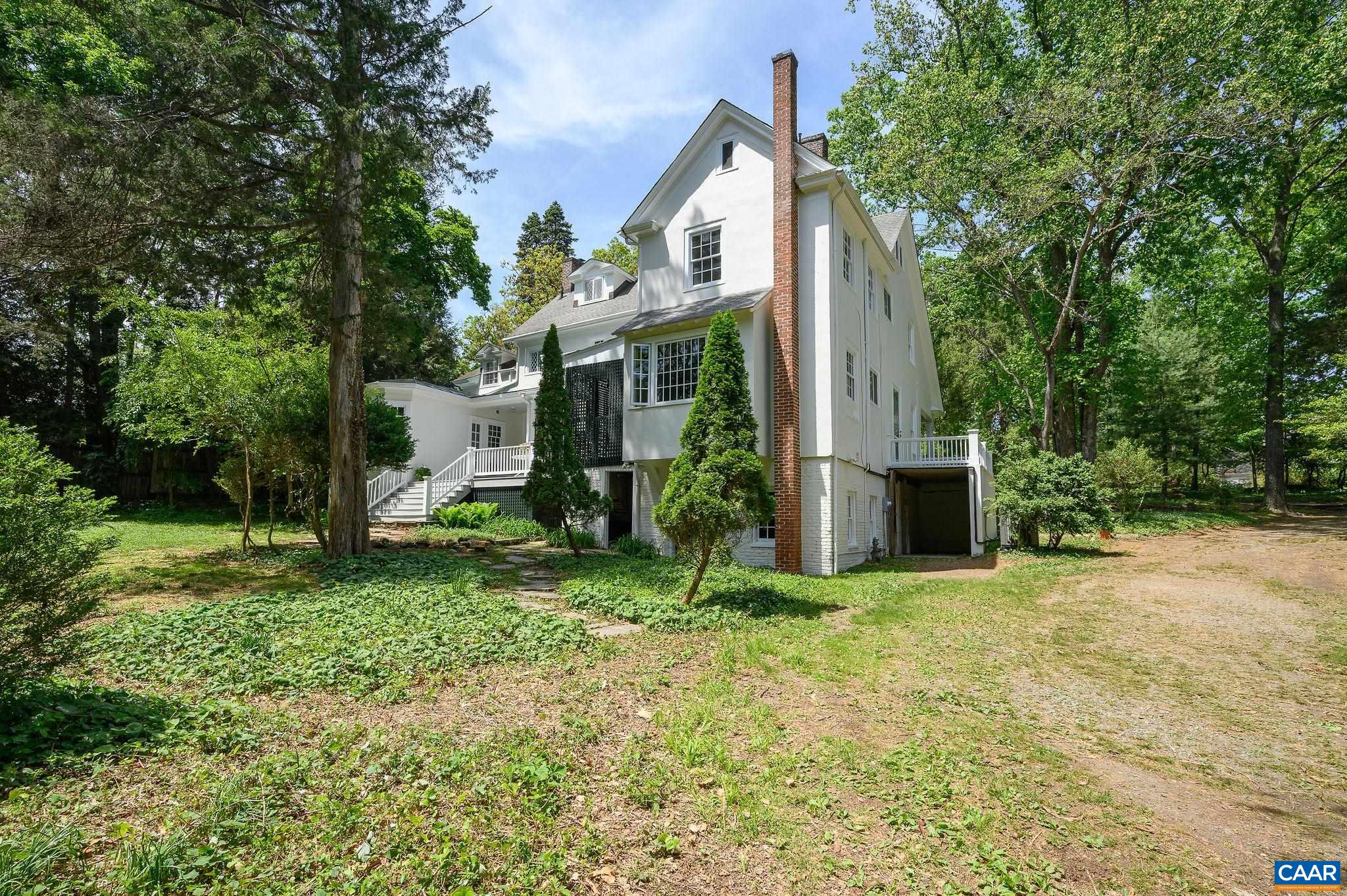1326 Rugby Road Charlottesville, VA 22903 - Photo 51 of 65 a view of a house with backyard and a tree