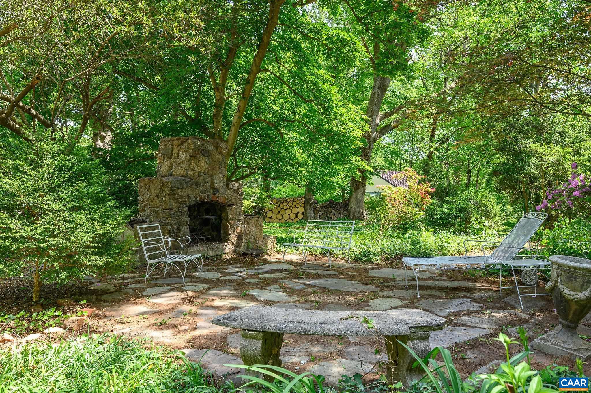 1326 Rugby Road Charlottesville, VA 22903 - Photo 53 of 65 a view of backyard of house with outdoor seating and green space