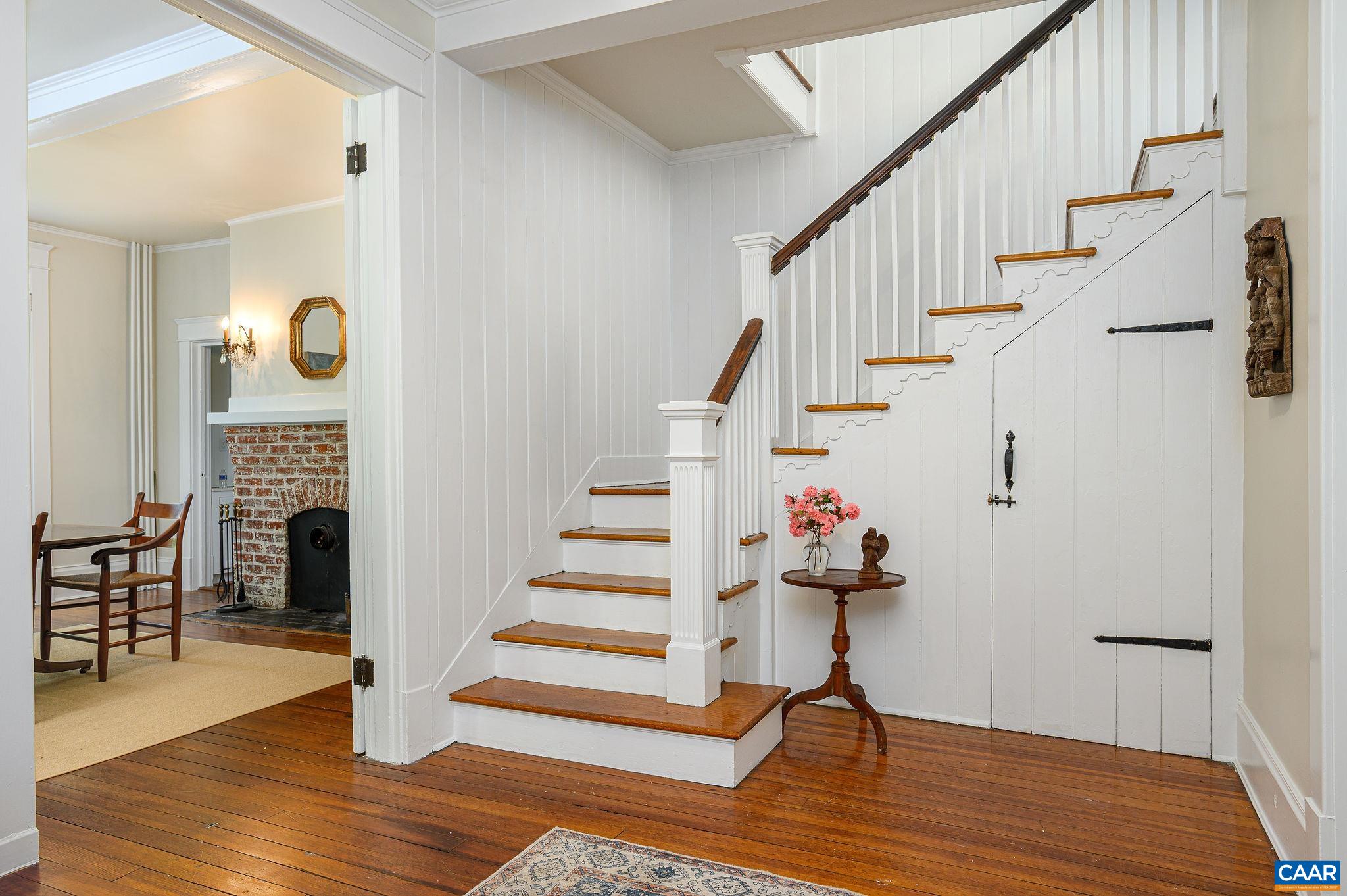 1326 Rugby Road Charlottesville, VA 22903 - Photo 8 of 65 a view of entryway and hall with wooden floor