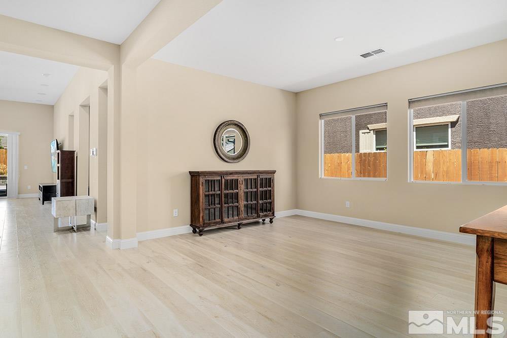 9545 Hawkshead Road Reno, NV 89521 - Photo 3 of 29 a view of an empty room with a window