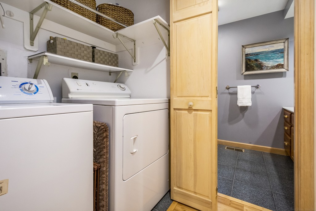 9 Powder Hill Way, Unit 9 Westborough, MA 01581 - Photo 15 of 30 a utility room with dryer and washer