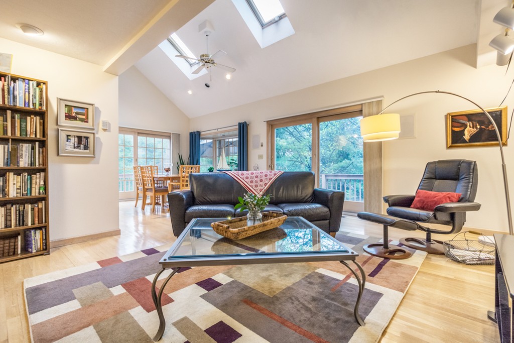 9 Powder Hill Way, Unit 9 Westborough, MA 01581 - Photo 5 of 30 a living room with furniture and a window
