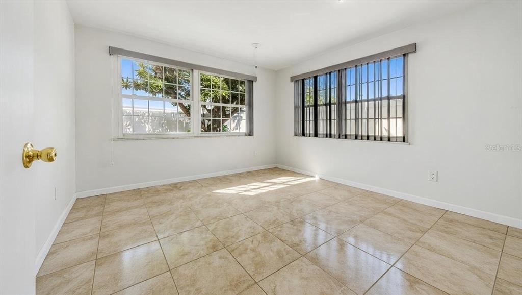 4033 Newcastle Drive New Port Richey, FL 34652 - Photo 6 of 12 a view of an empty room with a window