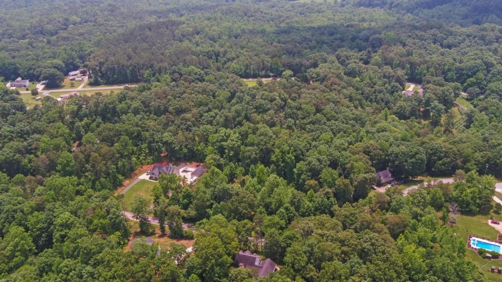 6755 Jake Kemp Road Murrayville, GA 30564 - Photo 4 of 22 a view of a house with a yard