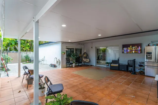 a view of a livingroom with furniture and window