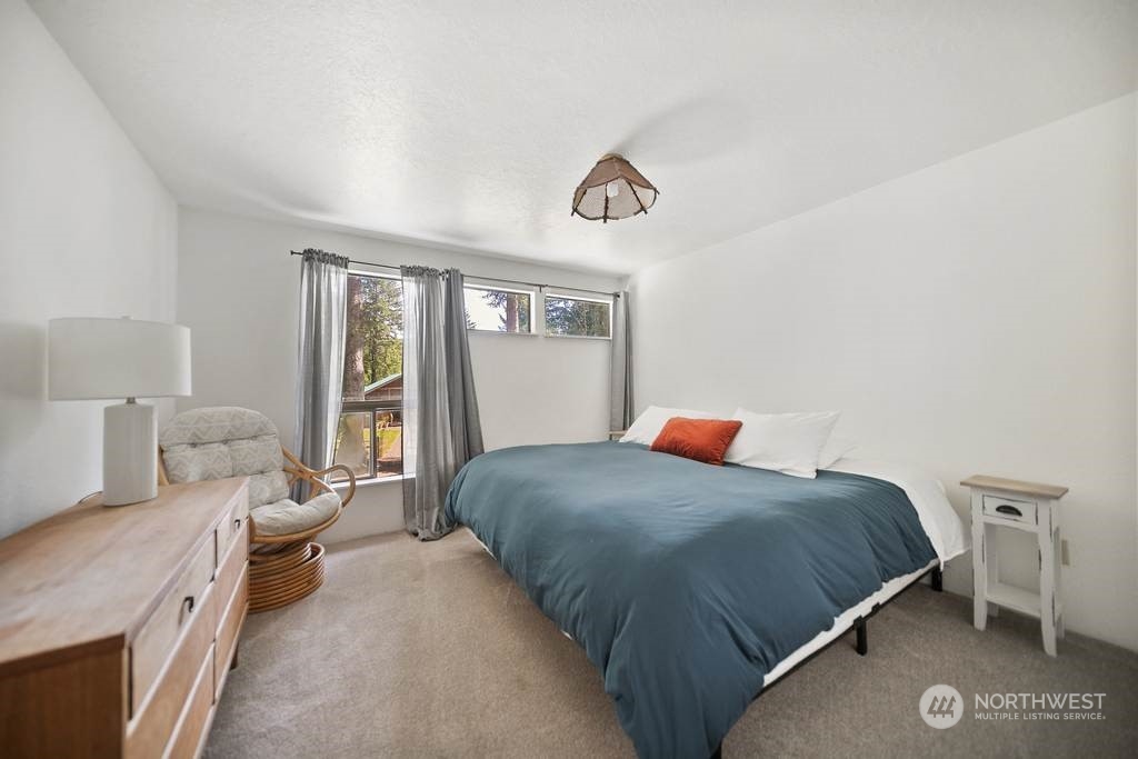 1171 Big Pine Way Forks, WA 98331 - Photo 20 of 40 a bedroom with a bed and a window