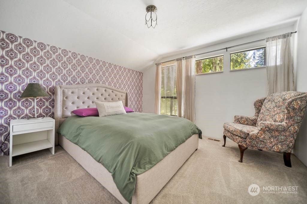 1171 Big Pine Way Forks, WA 98331 - Photo 22 of 40 a bedroom with a bed and a couch