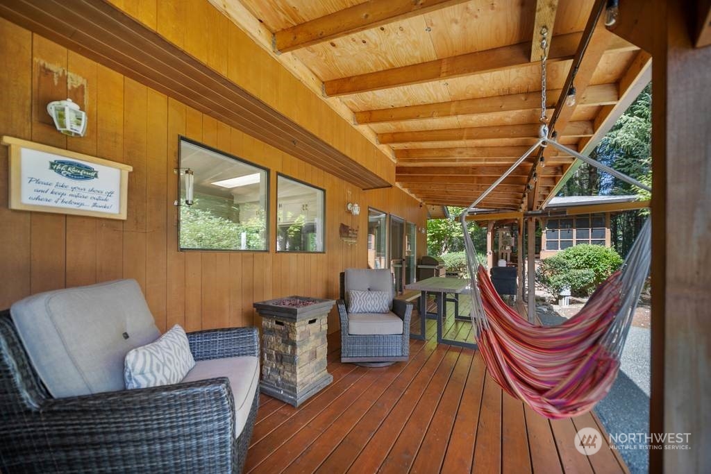 1171 Big Pine Way Forks, WA 98331 - Photo 25 of 40 a living room with furniture a window and wooden floor