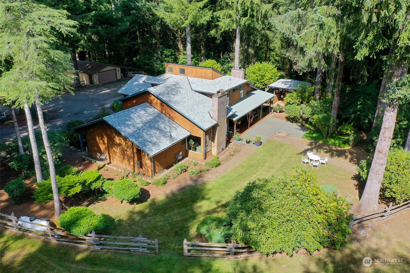 1171 Big Pine Way Forks, WA 98331 - Photo 27 of 40 an aerial view of a house with swimming pool a yard and outdoor seating