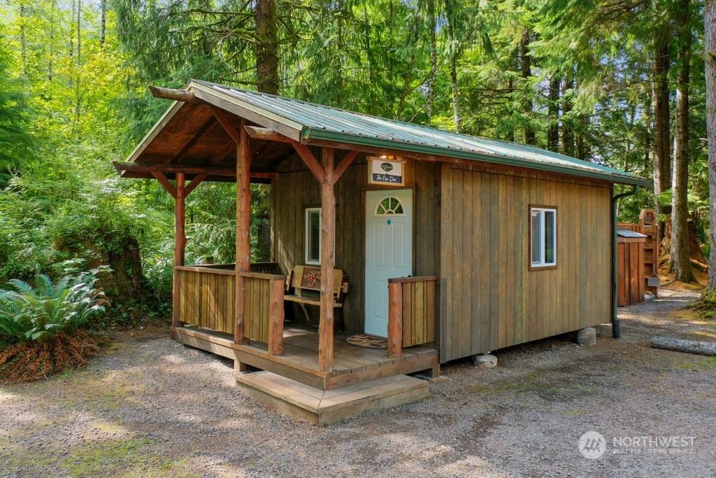 1171 Big Pine Way Forks, WA 98331 - Photo 31 of 40 a view of small house with backyard