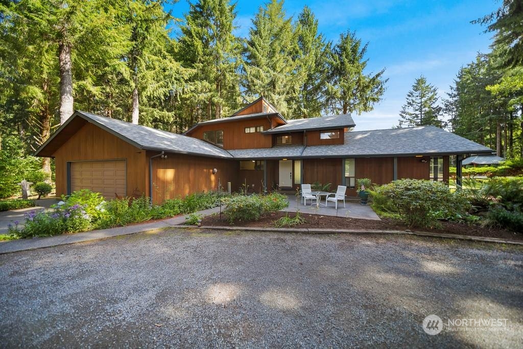1171 Big Pine Way Forks, WA 98331 - Photo 4 of 40 a front view of a house with garden