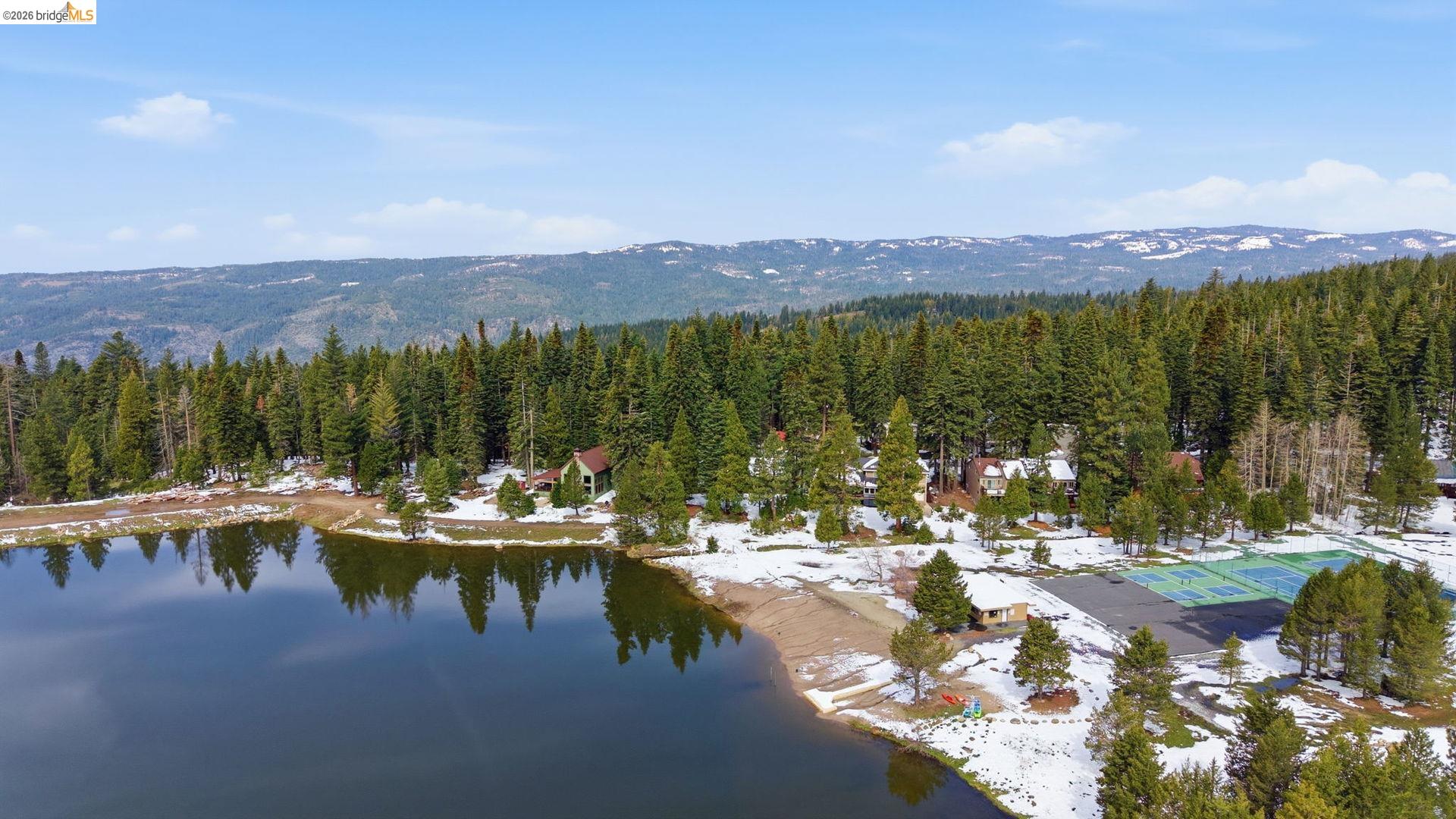 33840 Upper Leland Road, Unit 25A Pinecrest, CA 95364 - Photo 29 of 41 a view of a lake with a mountain