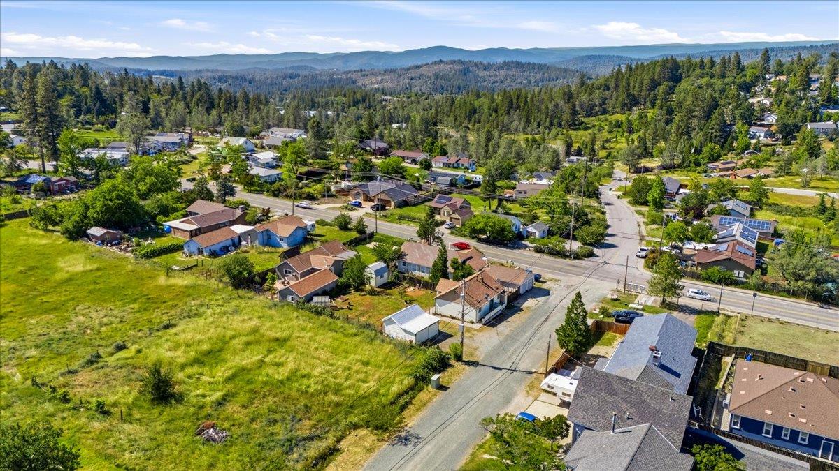 232 Upper Slate Creek Road Grass Valley, CA 95945 - Photo 48 of 48 a view of a city with lush green forest