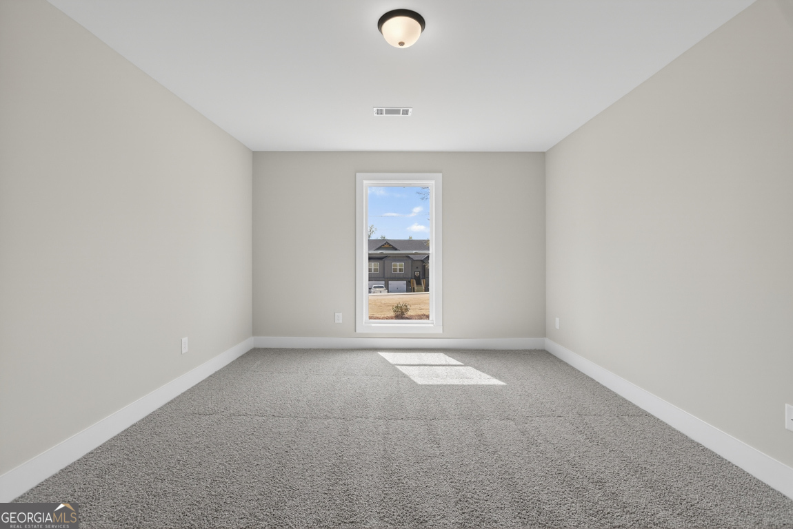 97 Wards Creek Road, Unit 1 Toccoa, GA 30577 - Photo 46 of 55 a view of an empty room with a window