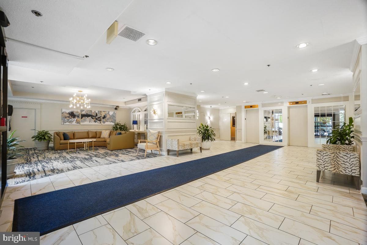15107 Interlachen Drive, Unit 2321 Silver Spring, MD 20906 - Photo 8 of 35 a large room with lots of counter space