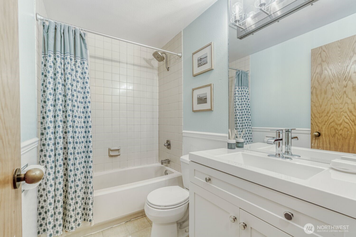 3501 Southwest Holden Street, Unit 303 Seattle, WA 98126 - Photo 18 of 30 a bathroom with a sink toilet and shower