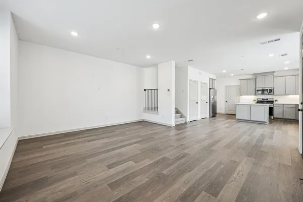 a view of kitchen with wooden floor
