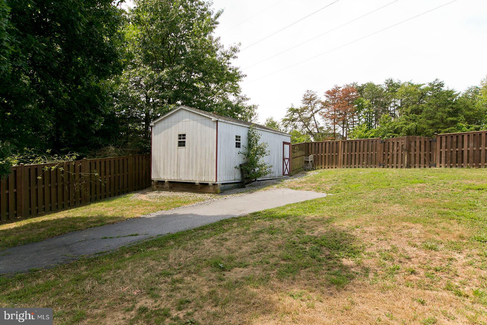 134 Woodrow Road Winchester, VA 22602 - Photo 13 of 49 Fenced backyard with shed
