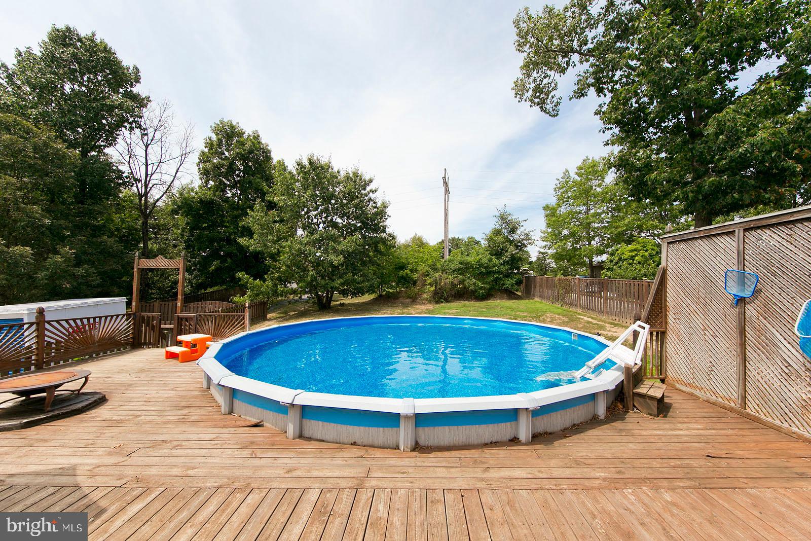 134 Woodrow Road Winchester, VA 22602 - Photo 4 of 49 Above ground pool/deck
