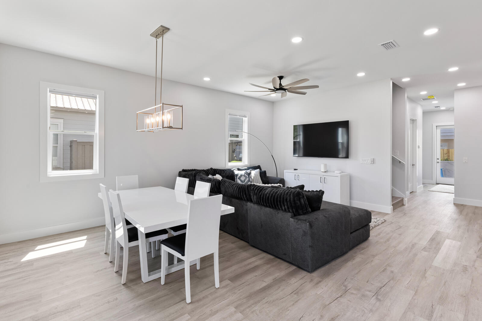 39 Charlotte Avenue Miramar Beach, FL 32550 - Photo 19 of 58 a view of a livingroom with furniture a flat screen tv and wooden floor