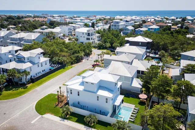 an aerial view of a house with a garden