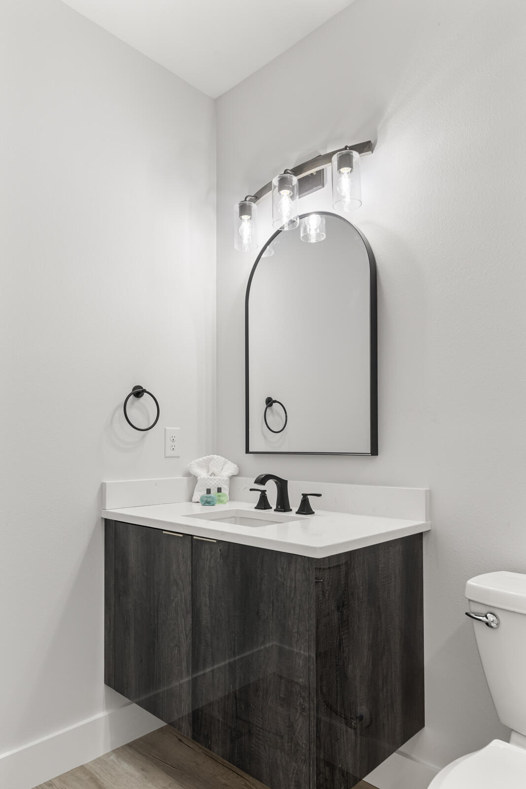 39 Charlotte Avenue Miramar Beach, FL 32550 - Photo 37 of 58 a bathroom with a toilet sink and mirror