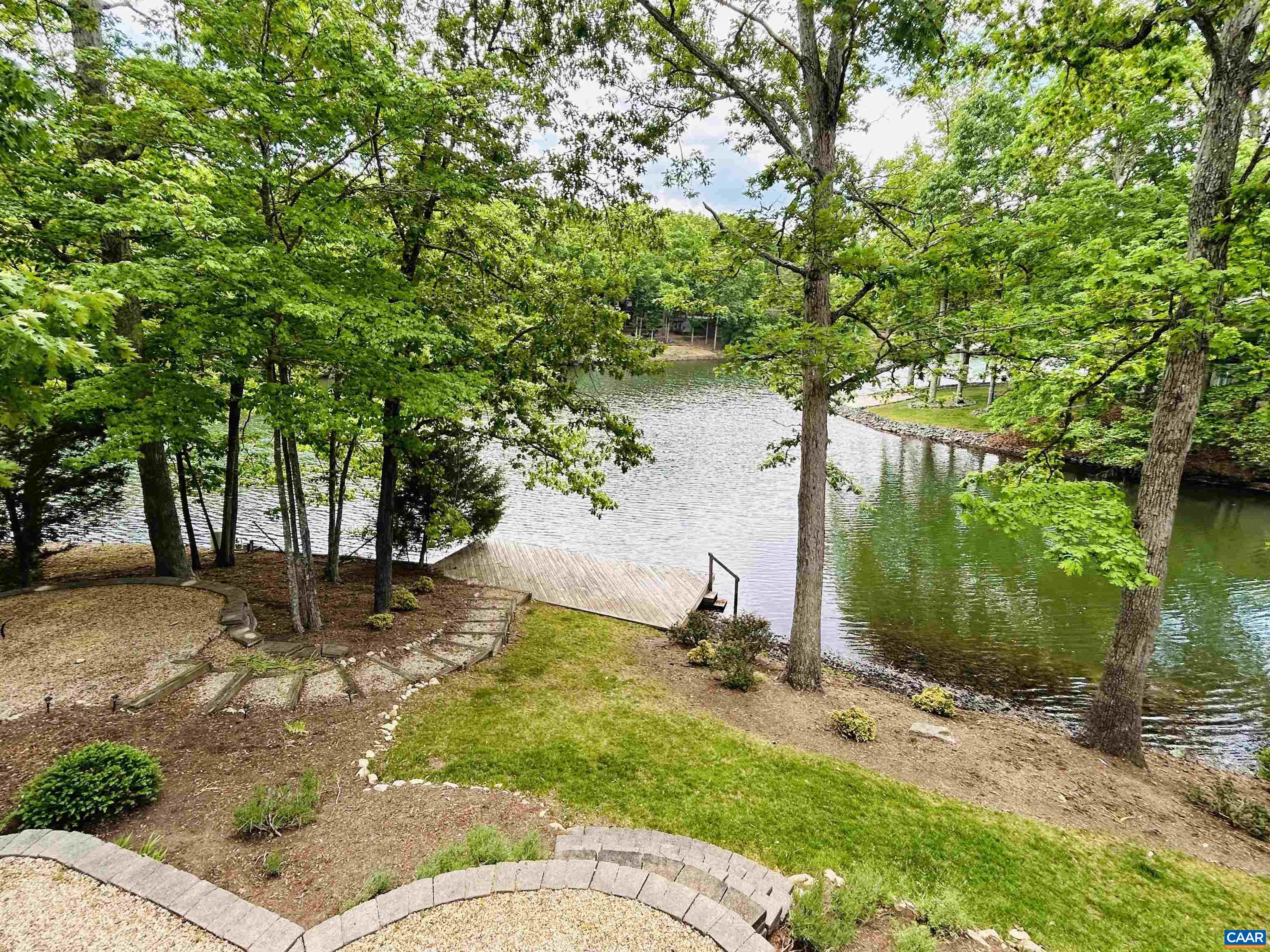 21 Amethyst Road Palmyra, VA 22963 - Photo 7 of 66 a view of backyard with outdoor seating and plants