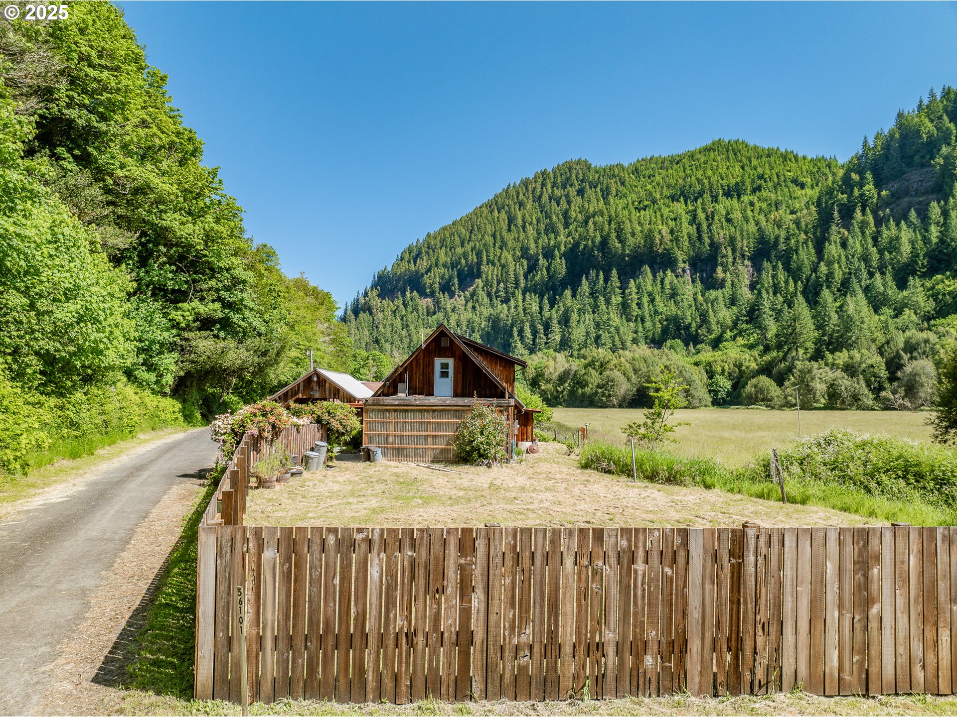 56101 Brummit Creek Road Myrtle Point, OR 97458 - Photo 11 of 47 a view of a wooden fence