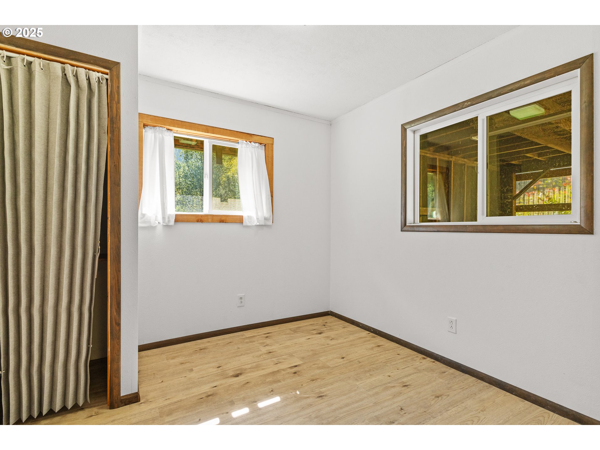56101 Brummit Creek Road Myrtle Point, OR 97458 - Photo 29 of 47 an empty room with a window