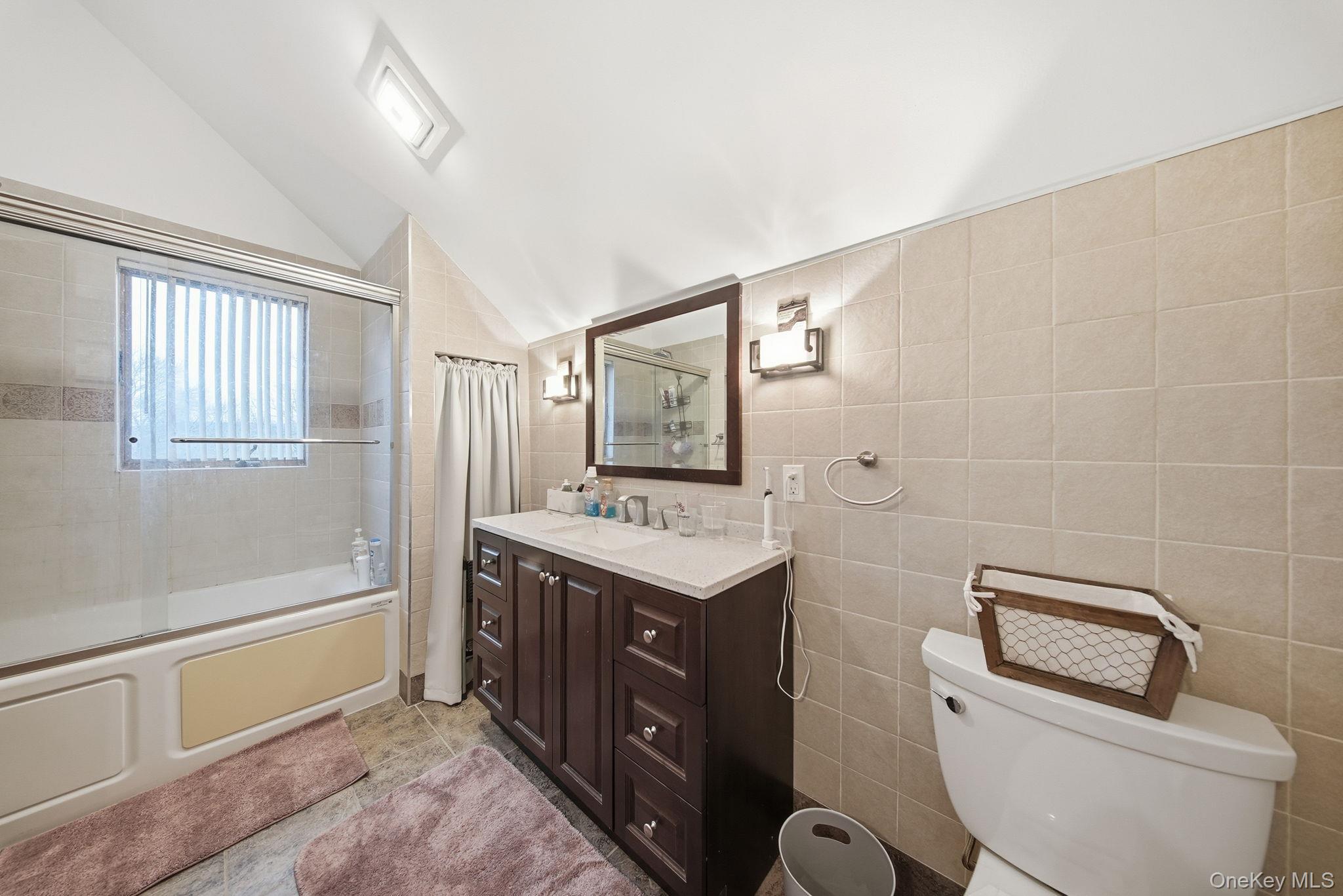 191 David Rhodes Road Wurtsboro, NY 12790 - Photo 23 of 39 a bathroom with a toilet sink and mirror