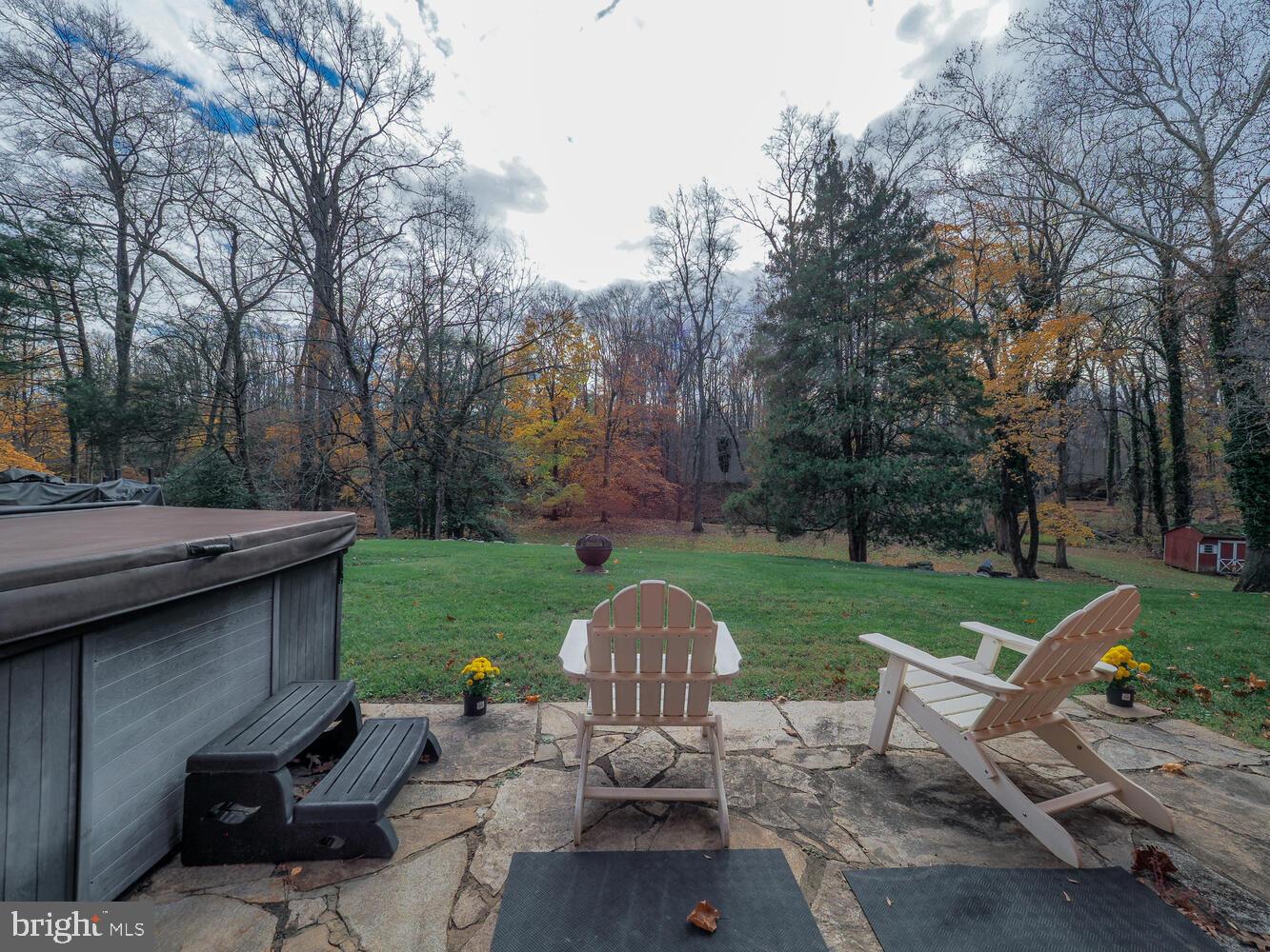 1108 Hampton Garth Towson, MD 21286 - Photo 12 of 53 a view of a table and chairs in backyard