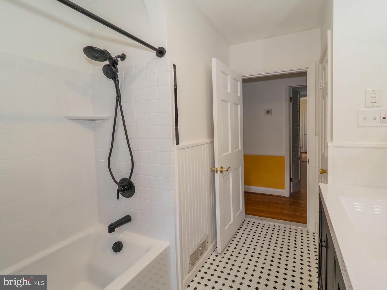 1108 Hampton Garth Towson, MD 21286 - Photo 19 of 47 Classic black and white tiles in the new bathroom