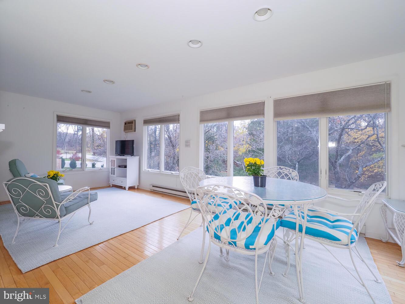 1108 Hampton Garth Towson, MD 21286 - Photo 32 of 47 Bright, airy sunroom with windows on three sides