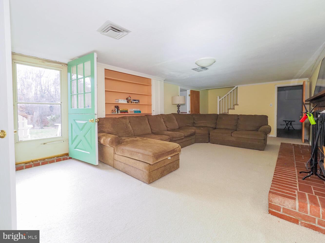 1108 Hampton Garth Towson, MD 21286 - Photo 44 of 53 a living room with a couch and a window