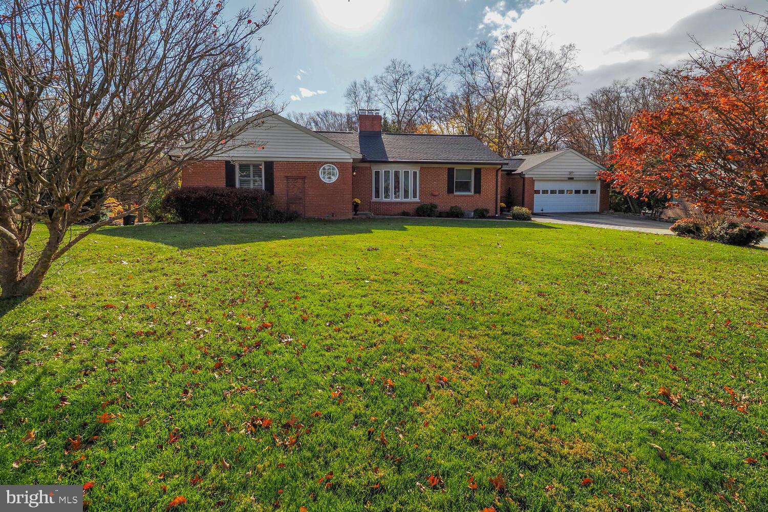 1108 Hampton Garth Towson, MD 21286 - Photo 5 of 53 a front view of house with yard and green space