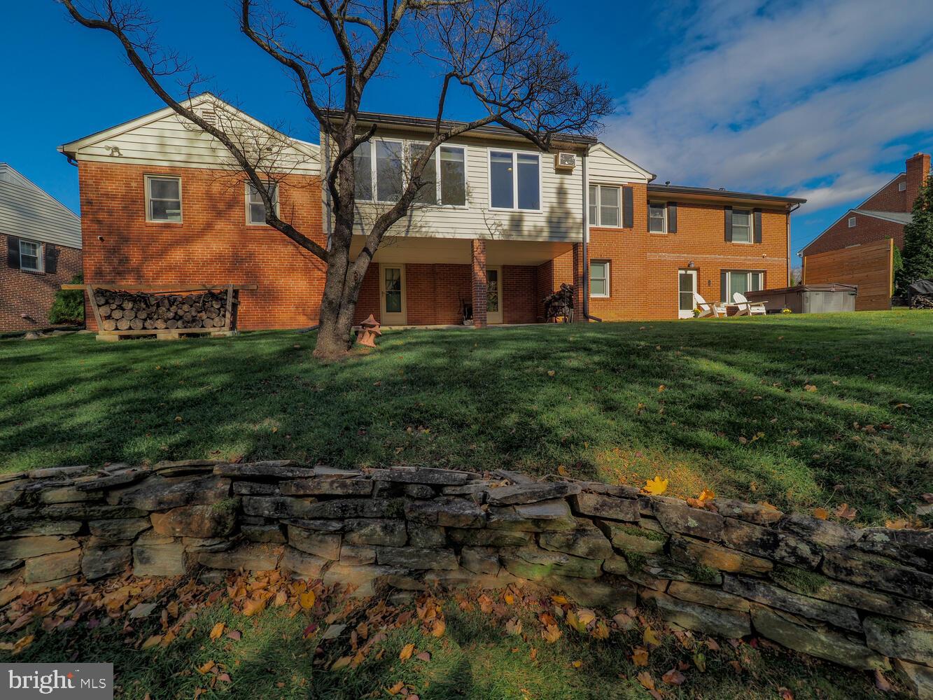 1108 Hampton Garth Towson, MD 21286 - Photo 8 of 53 a front view of house with yard and green space
