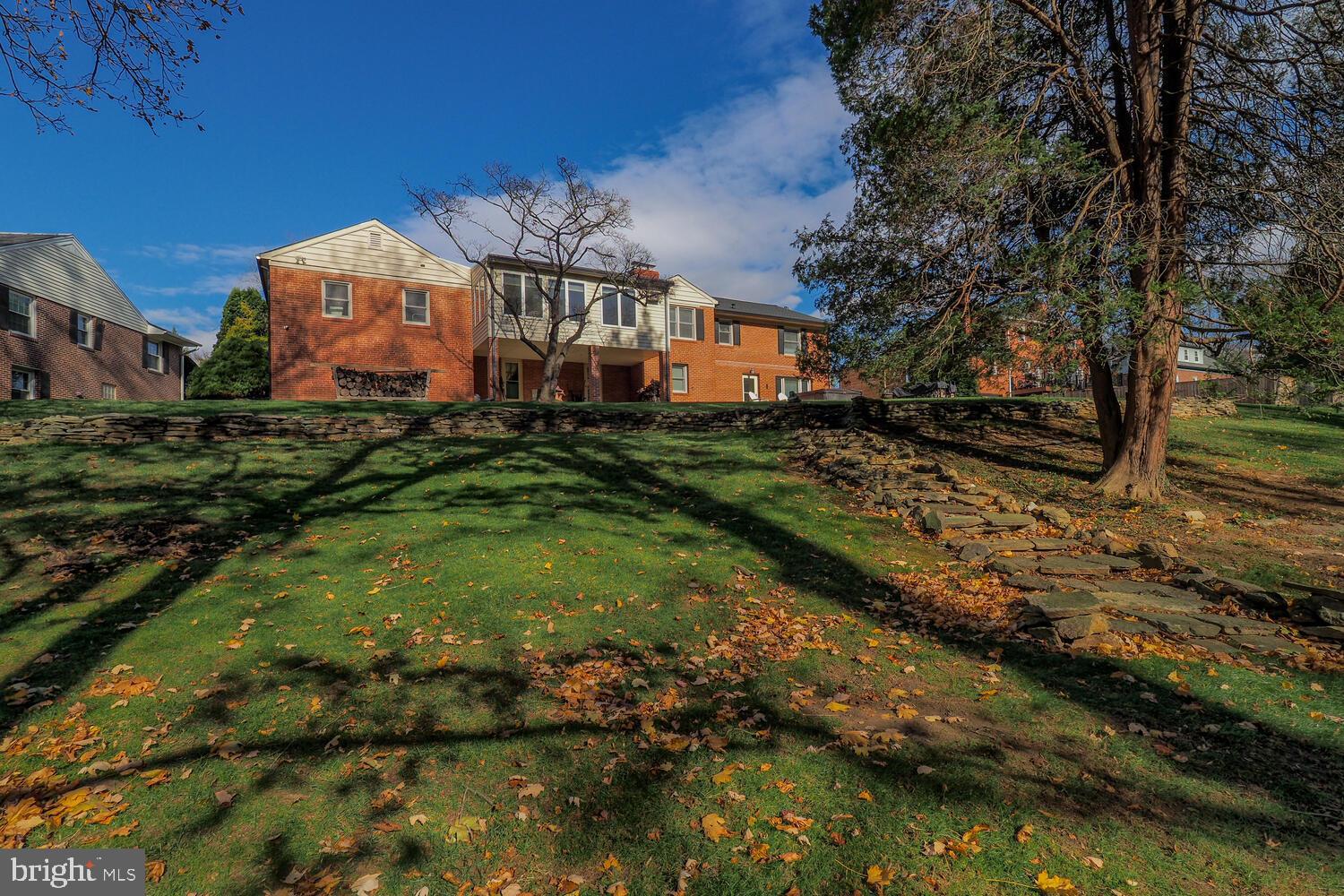1108 Hampton Garth Towson, MD 21286 - Photo 9 of 53 a front view of a house with a yard
