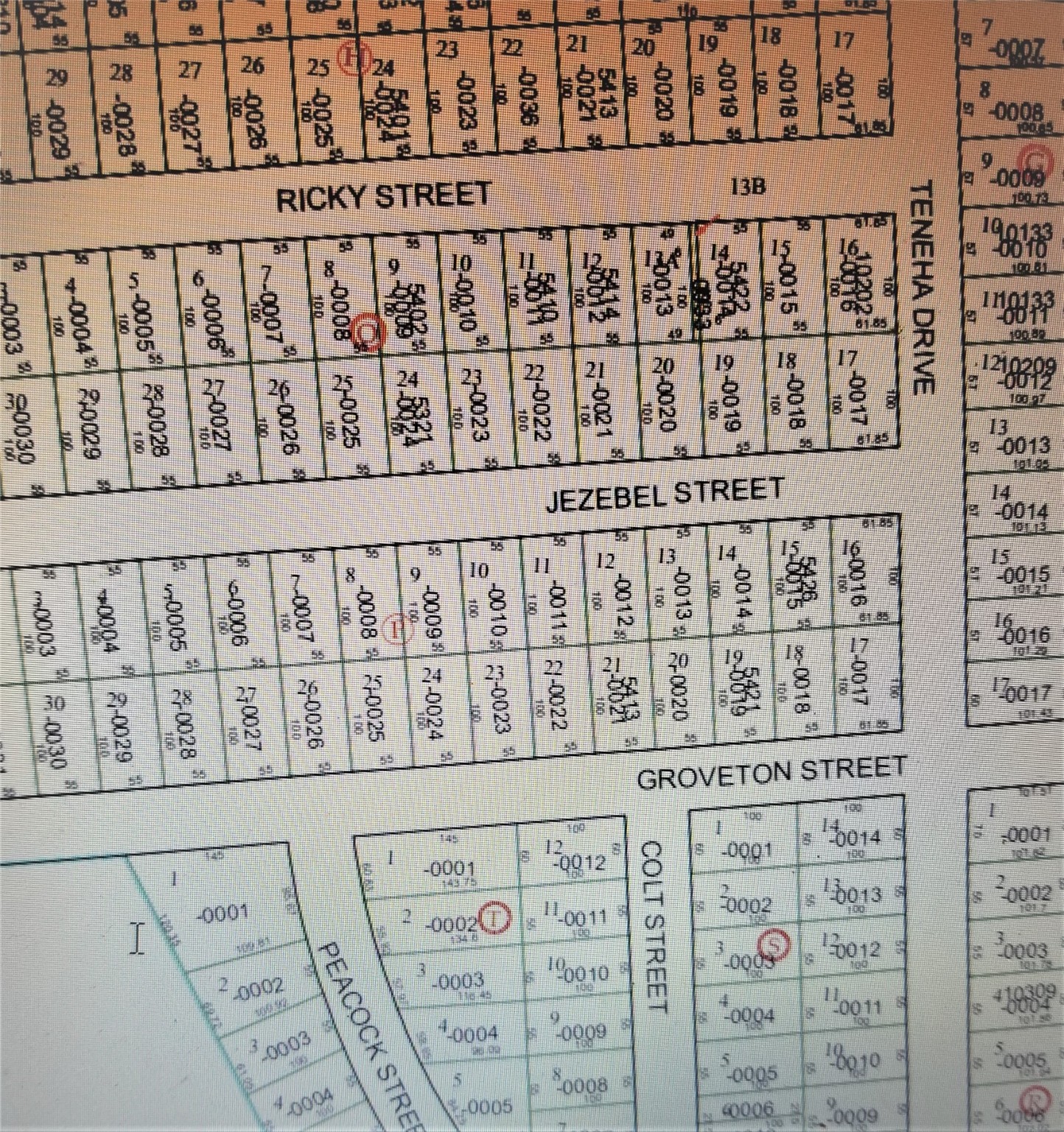 a black and white photo of a black gate