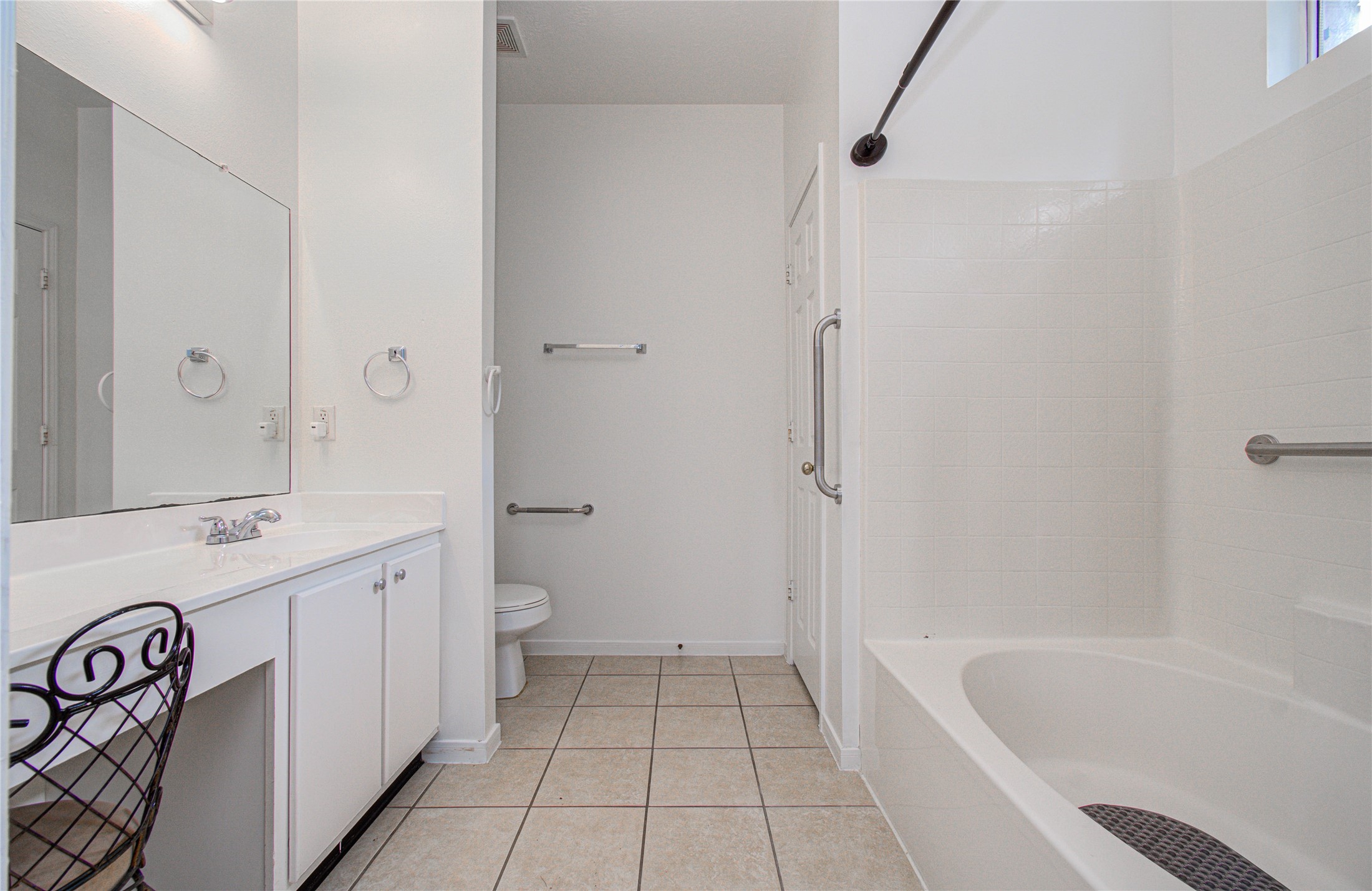 24135 Pinecreek Point Spring, TX 77373 - Photo 19 of 30 a bathroom with a granite countertop sink a toilet and shower