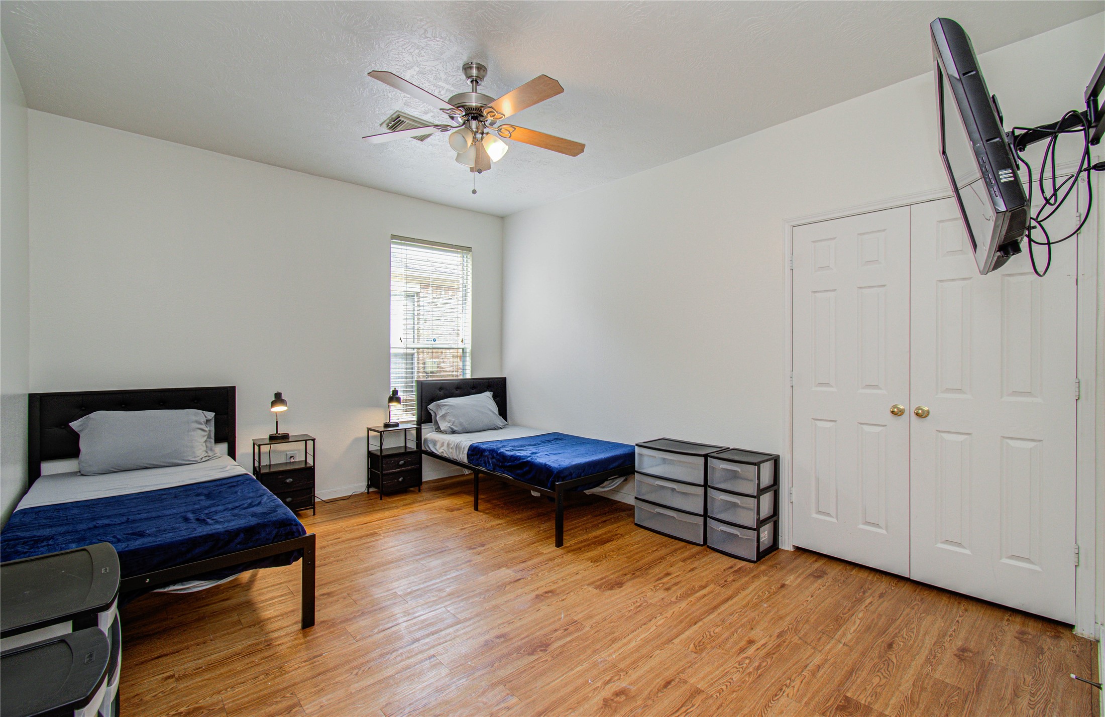 24135 Pinecreek Point Spring, TX 77373 - Photo 22 of 30 a living room with furniture and a wooden floor