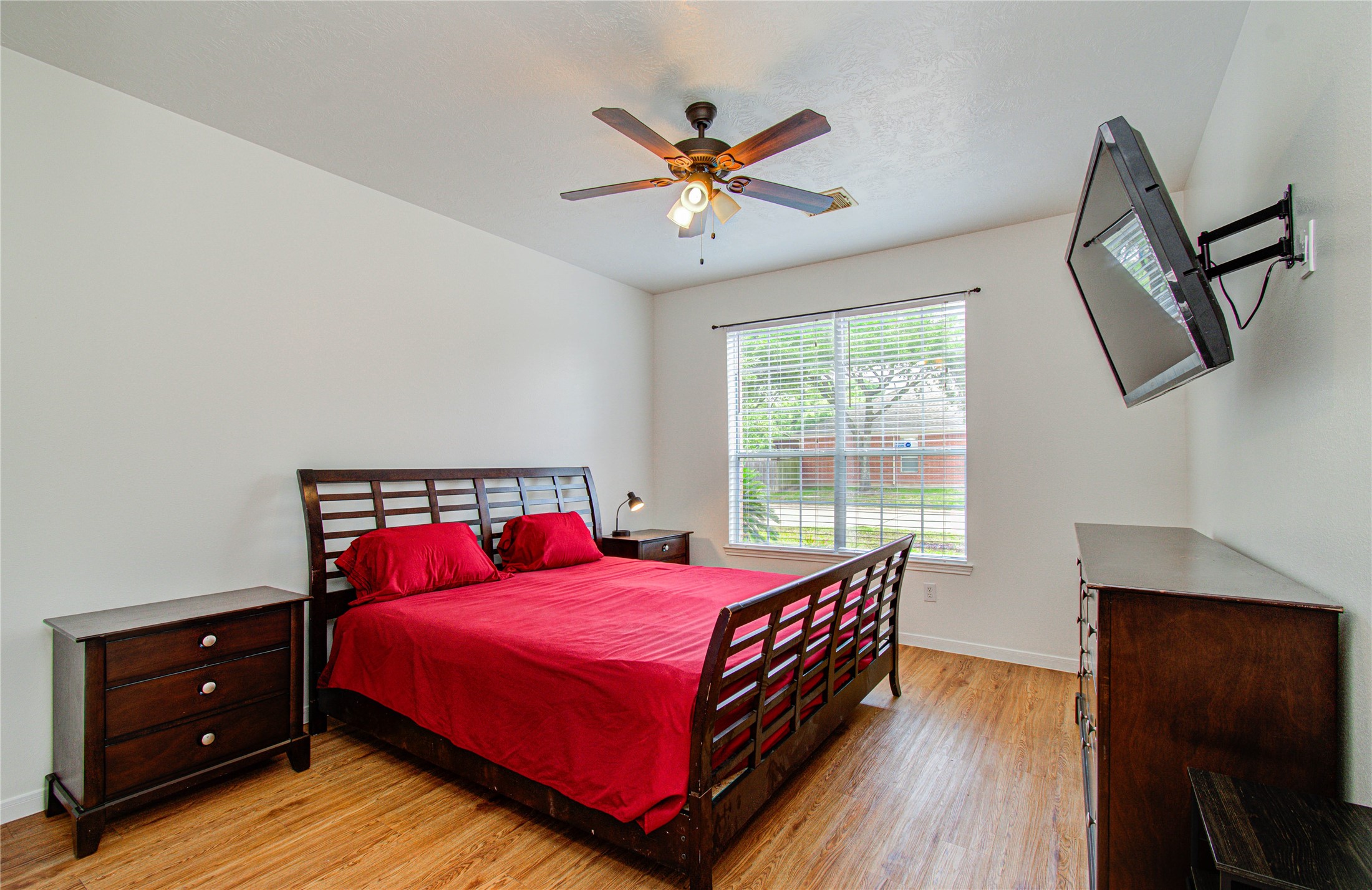 24135 Pinecreek Point Spring, TX 77373 - Photo 24 of 30 a bedroom with a bed and window