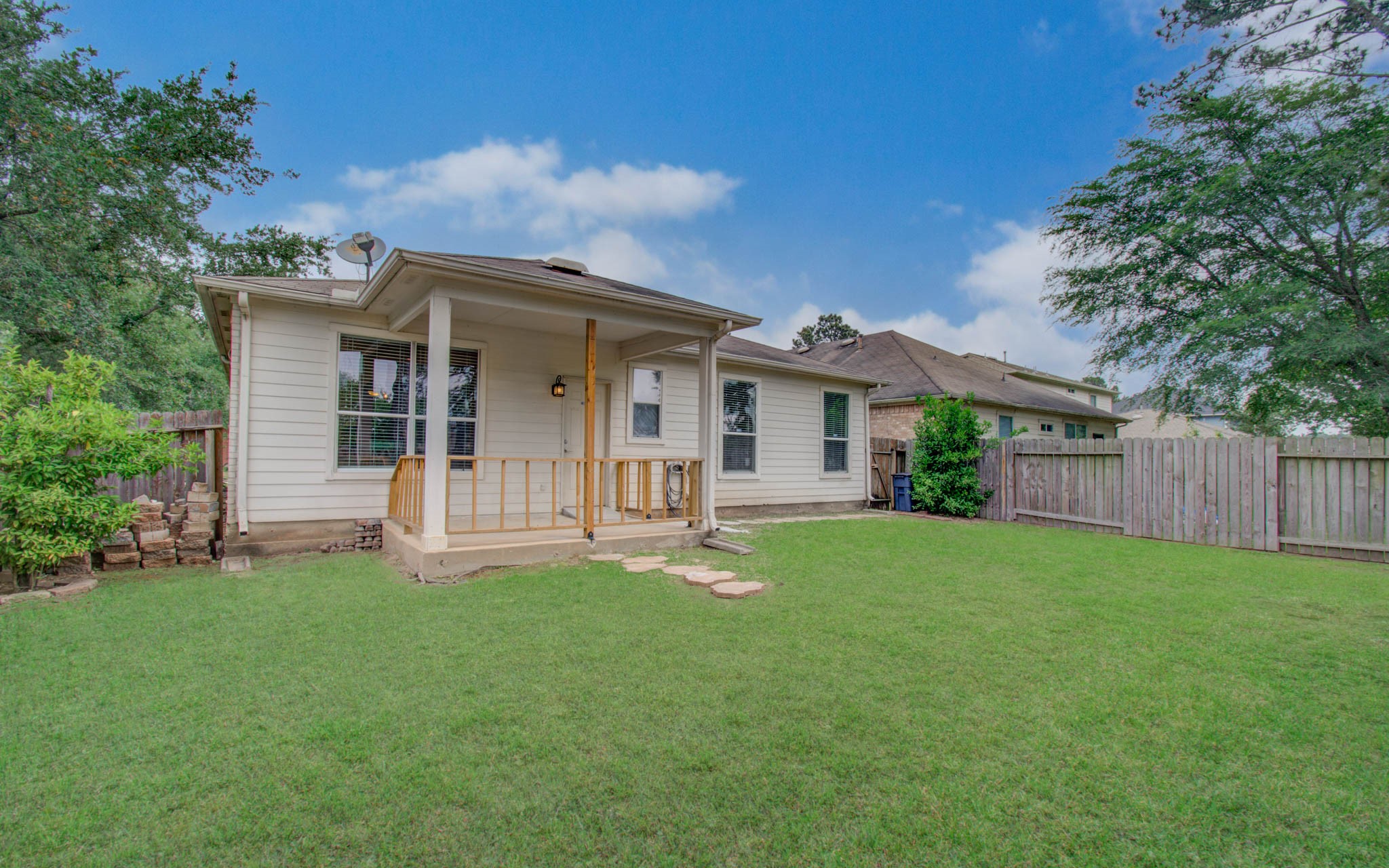 24135 Pinecreek Point Spring, TX 77373 - Photo 29 of 30 front view of a house with a yard