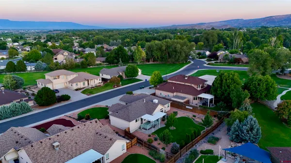 an aerial view of a house with a garden
