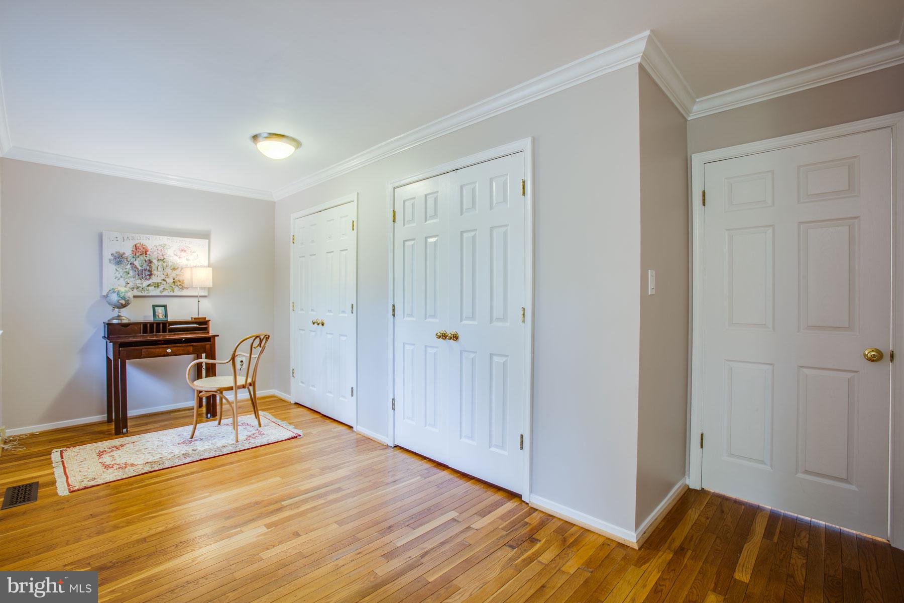 11783 Indian Ridge Road Reston, VA 20191 - Photo 14 of 25 a view of a livingroom with furniture and wooden floor