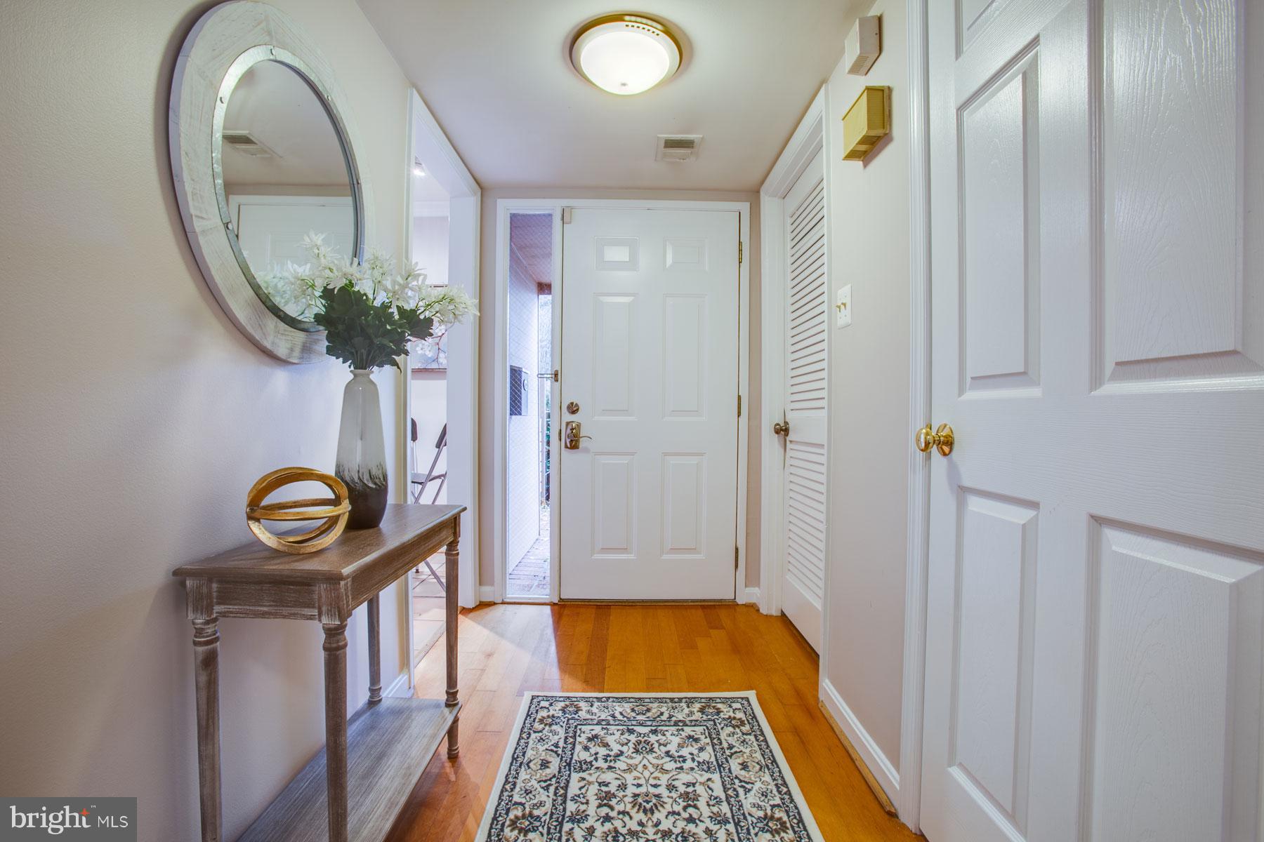 11783 Indian Ridge Road Reston, VA 20191 - Photo 3 of 25 a view of an entryway with wooden floor