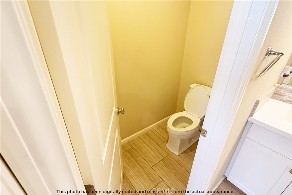 107 Mighty Oak Irvine, CA 92602 - Photo 19 of 22 a bathroom with a sink and a mirror