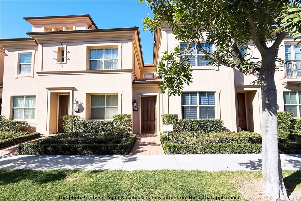 107 Mighty Oak Irvine, CA 92602 - Photo 2 of 22 front view of a house with a yard