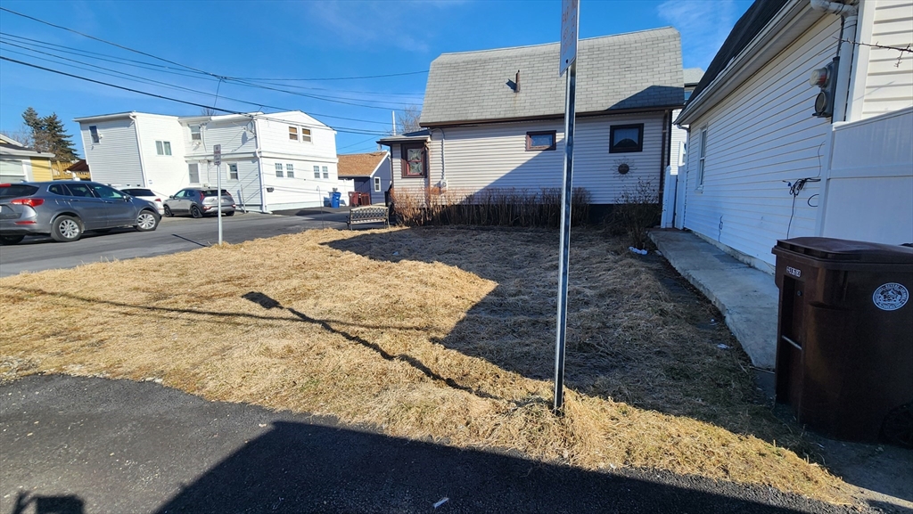 2 Leonard Road Revere, MA 02151 - Photo 3 of 8 a view of a street with cars