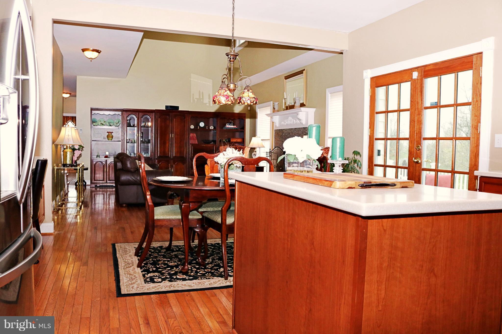 517 Rudder Road Shepherdstown, WV 25443 - Photo 12 of 25 a dining room with large window